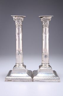 A PAIR OF GEORGE V SILVER COLUMNAR CANDLESTICKS, by Thomas 