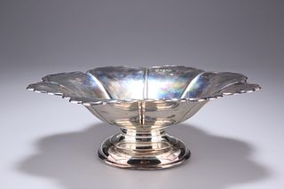 A GEORGE V SILVER FLUTED PEDESTAL DISH, by James Henry & He
