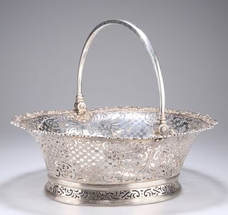 A FINE AND LARGE GEORGE II SILVER SWING-HANDLE BASKET, by S