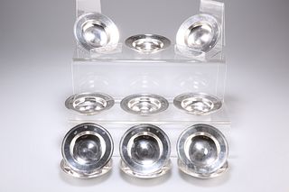 A SET OF TWELVE SILVER ARMADA DISHES, by Richards & Knight,