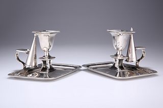 A PAIR OF GEORGE III CHAMBERSTICKS, by John Roberts & Co, S