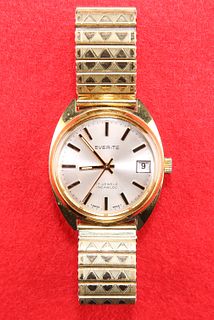 A GENTS GOLD PLATED EVERITE BRACELET WATCH. Circular silver