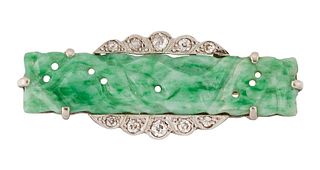 AN ART DECO JADE AND DIAMOND BROOCH, the carved and pierced