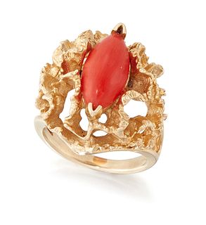 A 1960s CORAL DRESS RING, a marquise-shaped coral within an