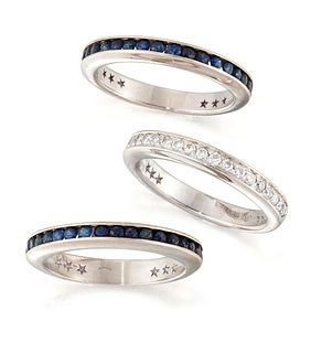 A SAPPHIRE AND DIAMOND TRIPLE HALF HOOP RING, formed of a c