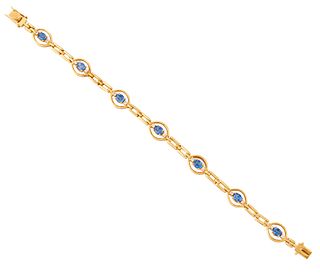 A SAPPHIRE BRACELET, oval-cut sapphires in claw settings fl