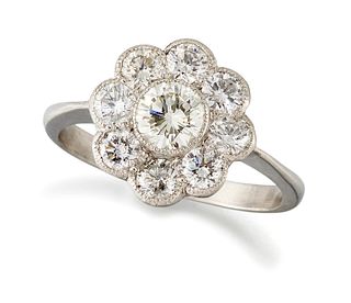 A Diamond Cluster Ring, a round brilliant-cut diamond withi