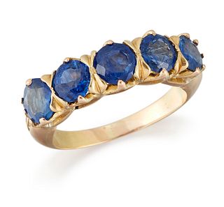 A SAPPHIRE RING, five round-cut sapphires in claw settings 
