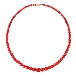 A CORAL BEAD NECKLACE, graduated coral beads to a spring ri