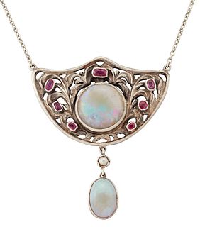 AN EARLY 20TH CENTURY OPAL AND RUBY PENDANT NECKLACE, a rou