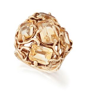 A 1960s CITRINE DRESS RING, five octagonal-cut citrines in 