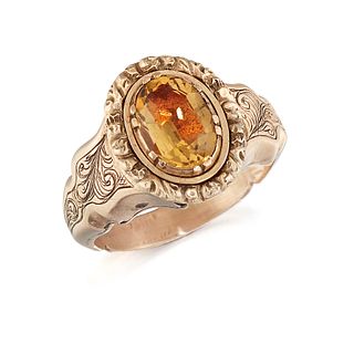 A CITRINE RING, a foil-backed oval-cut citrine in a cut-dow