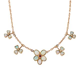 AN EARLY 20TH CENTURY OPAL AND GARNET NECKLACE, a central f