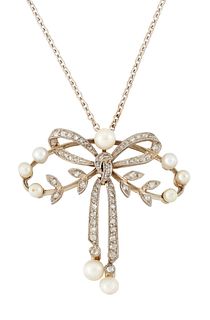 A BELLE EPOQUE DIAMOND AND PEARL PENDANT ON CHAIN, a centra