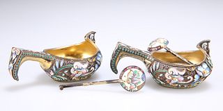 A PAIR OF RUSSIAN SILVER GILT AND CLOISONNE ENAMEL SALTS, E