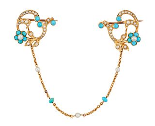 AN EARLY 20TH CENTURY TURQUOISE AND SEED PEARL CLOAK CLASP,