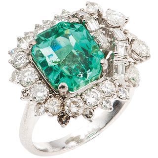 RING WITH EMERALD AND DIAMONDS IN PALLADIUM SILVER, Weight: 6.0 g, Size: 6 ¾, 1 Emerald octagonal faceted cut (chipped on the girdle)