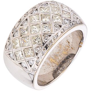 RING WITH DIAMONDS IN 18K WHITE GOLD Weight: 18.6 g. Size: 8 ¼ 16 Princess cut diamonds ~ 1.60 ct 34 Dia ...