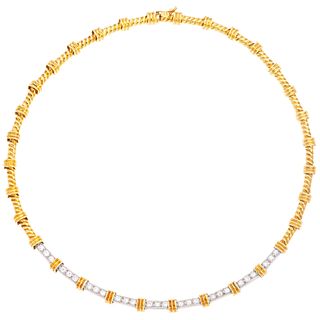 18K AND 14K YELLOW AND WHITE GOLD DIAMOND NECKLACE Box clasp, 8-shape safety. Weight: 33.6 g. Length: 37.8 ...