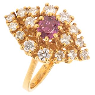 RING WITH RUBY AND DIAMONDS IN 18K YELLOW GOLD Weight: 5.2 g. Size: 6 ¾ 1 Ruby faceted oval cut ~ 0.56 ct