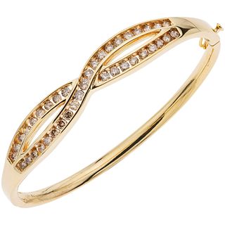 14K YELLOW GOLD DIAMOND BRACELET Rigid. Box clasp with 8-shaped safety. Weight: 18.0 g. Length: 6.4" (16.5 cm)