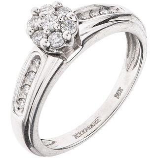 RING WITH DIAMONDS IN 14K WHITE GOLD Weight: 4.0 g. Size: 7 15 Brilliant cut diamonds ~ 0.30 ct