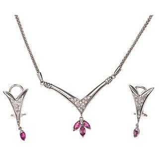 SET OF CHOKER AND PAIR OF EARRINGS WITH RUBIES AND DIAMONDS IN 14K WHITE GOLD Choker with carabiner clasp. Lar ...
