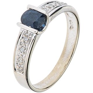 RING WITH SAPPHIRE AND DIAMONDS IN 14K WHITE GOLD Weight: 2.8 g. Size: 7 ¼ 1 Faceted oval cut sapphire ~ 0.50 ct ...