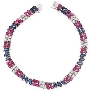 18K WHITE GOLD BRACELET WITH RUBIES, SAPPHIRES AND DIAMONDS Box clasp with eight-shape safety. Weight: 13.9 g. Length: 7.2" (18.5 cm)