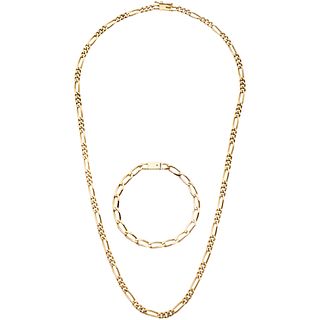 NECKLACE AND BRACELET IN 14K YELLOW GOLD Necklace with box clasp and eight-shape safety. Length: 21.9" (55.7 cm)
