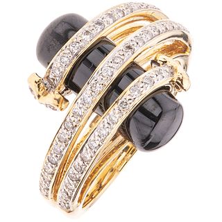 RING WITH “NIX AND DIAMONDS IN 18K YELLOW GOLD Weight: 7.6 g. Size: 5 ¾ 1 Onyx application ...