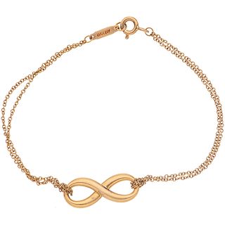 18K YELLOW GOLD BRACELET FROM THE FIRM TIFFANY & CO. TIFFANY INFINITY COLLECTION Carabiner clasp. Weight: 3.2 g.