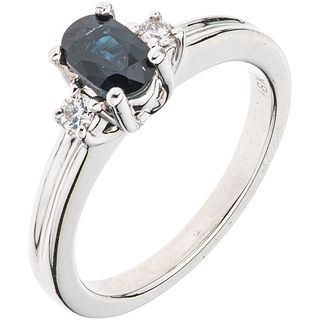 RING WITH SAPPHIRE AND DIAMONDS IN 18K WHITE GOLD Weight: 4.8 g. Size: 6 1 Faceted oval cut sapphire ~ 0.50 ct