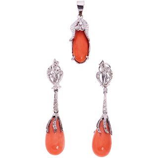 PENDANT AND PAIR OF EARRINGS WITH CORAL AND DIAMONDS IN SILVER PALADIUM Post earrings. Size: 0.39 x 2" (1.0 x 5.3 cm)
