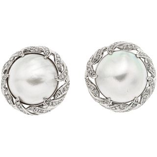 PAIR OF EARRINGS WITH HALF PEARLS AND DIAMONDS IN PALLADIUM SILVER Weight: 18.0 g. Diameter: 0.86" (2.2 cm)