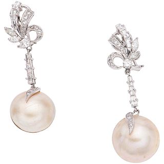 PAIR OF EARRINGS WITH HALF PEARLS AND DIAMONDS IN PALLADIUM SILVER Weight: 11.6 g.