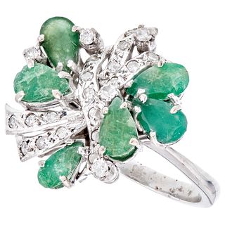 RING WITH EMERALDS AND DIAMONDS IN PALLADIUM SILVER Weight: 8.2 g. Size: 9 ½