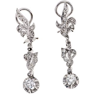 PAIR OF EARRINGS WITH DIAMONDS IN PALLADIUM SILVER Weight: 6.0 g. Size: 0.35 x 1.5" (0.9 x 4.0 cm)