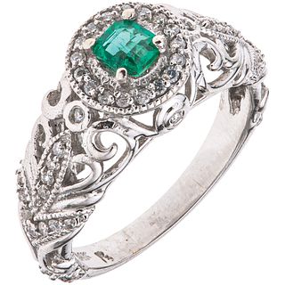 14K WHITE GOLD RING WITH EMERALD AND DIAMONDS Weight: 5.7 g. Size: 7 ¼ 1 Emerald cut octagonal faceted ...