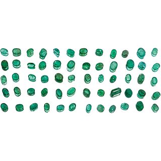 UNMOUNTED EMERALDS 2 Emerald cut emeralds (one slightly chipped), 57 faceted oval cut, 1 round cut fac ...