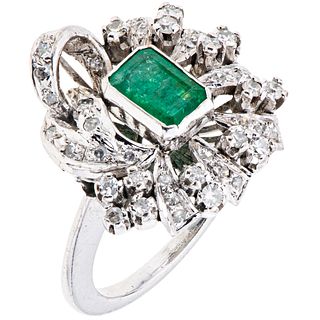 RING WITH EMERALD AND DIAMONDS IN PALLADIUM SILVER Weight: 5.8 g. Size: 6 ½ 1 Emerald octagonal faceted cut ~ 0.7 ...