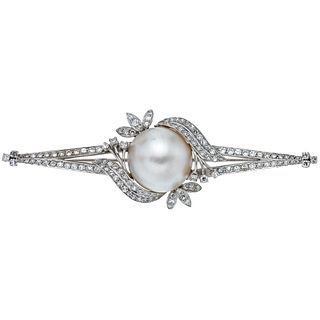 PENDANT WITH HALF PEARL AND DIAMONDS IN SILVER PALLADIUM Pin and safety. Weight: 12.7 g. Size: 0.98 x 3.1" (2.5 x 7.9 cm) 1 Medium ...