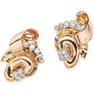 PAIR OF 18K WHITE AND ROSE GOLD DIAMOND EARRINGS Weight: 10.1 g. Size: 0.62 x 0.94" (1.6 x 2.4 cm)