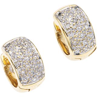 PAIR OF 14K YELLOW GOLD DIAMOND EARRINGS Post and snap lock. Weight: 4.7 g. Size: ...