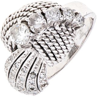 RING WITH DIAMONDS IN 18K WHITE GOLD Weight: 10.5 g. Size: 6 ¾ 5 Brilliant cut diamonds ~ 0.70 ct 18 Di ...