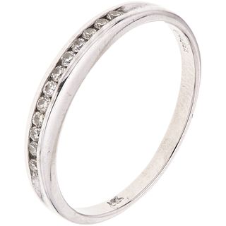 RING WITH DIAMONDS IN 14K WHITE GOLD Weight: 1.7 g. Size: 6 ½ 12 Brilliant cut diamonds ~ 0.12 ct