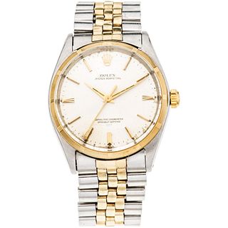 ROLEX OYSTER PERPETUAL WATCH IN STEEL AND 14K YELLOW GOLD REF. 1003, CA. 1953 - 1954 Movement: automatic.