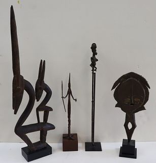 4 Antique African Carvings / Sculptures .