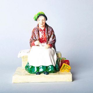Paper Seller Figurine