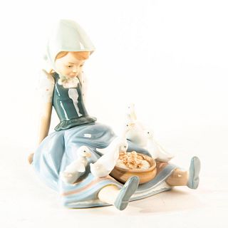 Girl, Saucepan and Duck 1980/1997 01005074 - Lladro Porcelain Figure